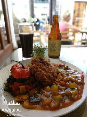 Rocoto relleno, pastel de papa, guiso y torrejita. at Omphalos in Arequipa