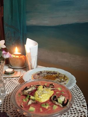 Polish soup "; red borsch"; which had fernentated cabbage, beatroot, carrot, tomato, awakado and sunflower cream. +&+ Raw ";omelette"; from young coconut with onion and spices!! at Nata Raw in Szczecin