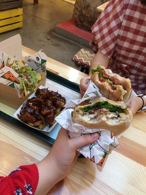Two burgers, chips with super nice sauce and nachos. at La Trocadero in Barcelona