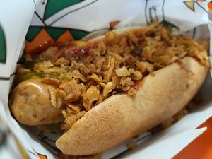 Classic hot dog - the toppings give the flavor, the hot dog itself doesn't have flavor. It was really yummy though! at La Trocadero in Barcelona