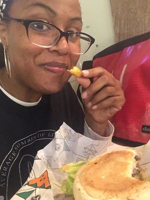 Happily stuffing my face with patatas especiadas! at La Trocadero in Barcelona