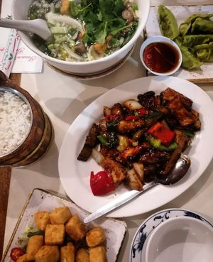 Noodle soup, salt and pepper tofu and delicious aubergine and beancurd in black bean sauce at Saigon68 in Sheffield