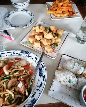 Fried noodles with chick*n, salt and pepper tofu, summer rolls and chips at Saigon68 in Sheffield