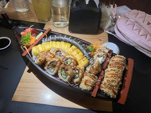 Sushi boat with crispy vegano, Fuji, tofu veggie, and vegano rolls    at Kappa Sushi in La Fortuna