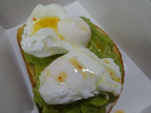 Poached Eggs & Smashed Avocado on Toast  at Riverside Cafe in Leicester