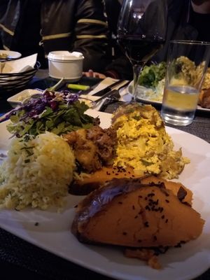 English name was spirit tofu. It came with sweet potato, rice, and salad  at Organi Chiado in Lisbon