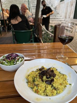 Risotto with three kinds of mushrooms, side salad with pomegranate seeds  at Organi Chiado in Lisbon