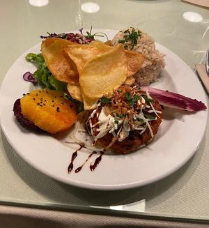 Legime burger with potatoes and greens at Organi Chiado in Lisbon