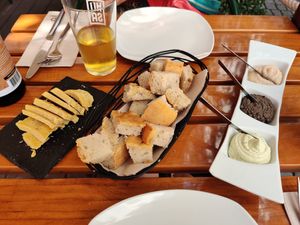 Starters - chease, rice bread, pate's at Organi Chiado in Lisbon