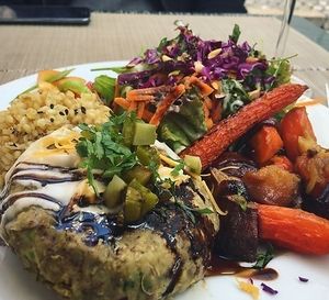  Lentil Burger and caramelized lentil, Rice, sweet potato and carrot sautéed, salad and sauce at Organi Chiado in Lisbon