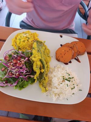 Scrambled tofu, deep fried chard, salad rice and sweet potato at Organi Chiado in Lisbon