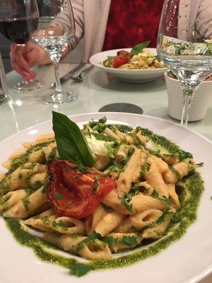 Creamy cashew tomato pasta with pesto at Organi Chiado in Lisbon