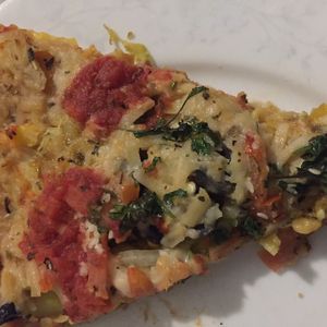 bezalya with vegan cheese at Mr Natural Vegetarian Pizza in St Kilda