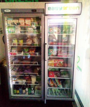 Fridges with cold and frozen food at EasyGreen Vegan Foodstore & Snack bar in Porto