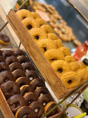 Our famous baked pumpkin spice donuts dipped in 72% dark chocolate. at Chic Peas Veg in Toronto
