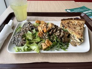 Vegan quiche with side salad containing olive paste, tofu and mushrooms.  at Saladas+ in Aveiro