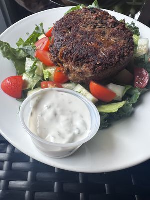 Black bean burger salad with vegan spread  at The Courtyard Juice and Fitness Center in St Croix