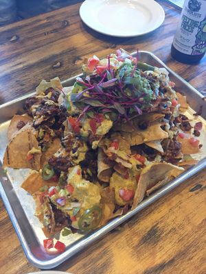 Vegan nachos were so good! at The Blaq Square in Valencia