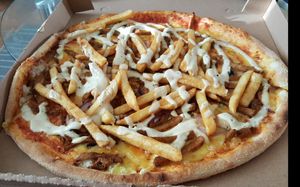 Vegan kebabpizza with added fries at Kungsgrillen in Vaxjo