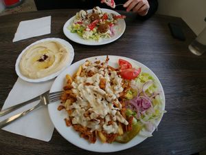 Vegan kebab with fries, falafel salad, and hummus. (Vegan sauces) at Kungsgrillen in Vaxjo