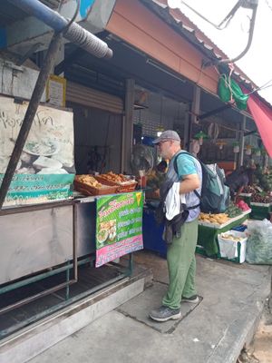 At end of fruit stalls at Tue Kha & Fried Tofu - Food Stall in Chiang Rai