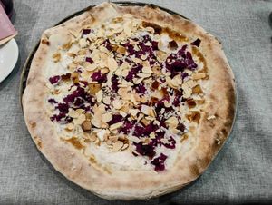 Tofu cabbage almond apple pizza - delicious! at Al Lampione in Gorizia