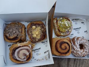 selection of cinnamon rolls at Peas in Hasselt