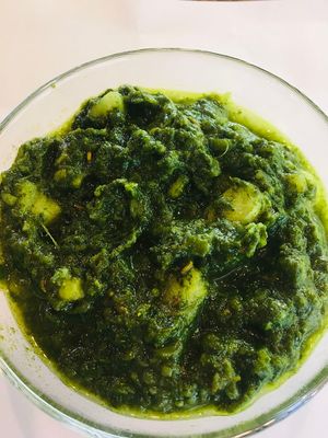 saag aloo 
made with spinach  potato and curry,super healthy . at Zest Foods in Kobe
