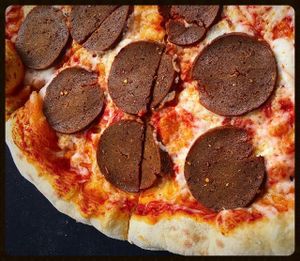 Seitan pepperoni,tomato sauce and mozzeralla. at Floralia in Honolulu