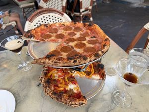 Top: pepperoni. Bottom: pesto royale but with red sauce. Espresso martinis.   at Floralia in Honolulu
