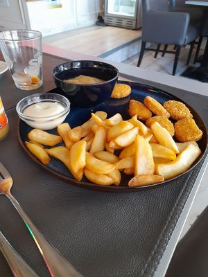 Kids vegan nuggets, chips, apple compote and veganese sauce at Le Touquet in Oostende