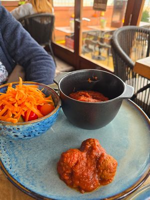Balls in tomato sauce and greens at Le Touquet in Oostende