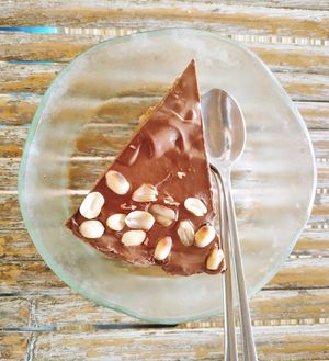 Vegan Snickers Chocolate Cake at Green Leaf Cafe in Jemuluk