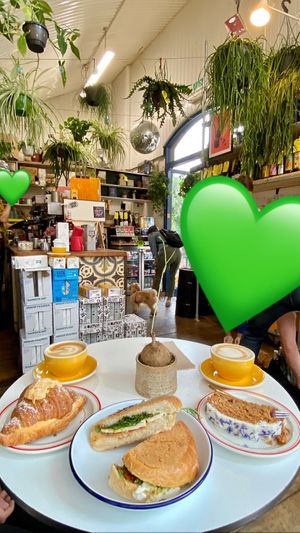 Almond croissant, mozzarella and pesto sandwich + carrot cake  at The Fields Beneath - Kentish Town in North West London