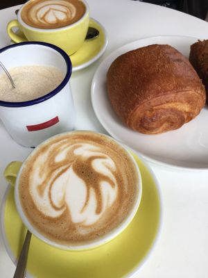 Chocolate croissant and lattes at The Fields Beneath - Kentish Town in North West London