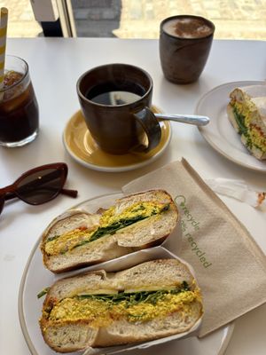 Bagel with scrambled tofu  at The Fields Beneath - Kentish Town in North West London