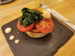 Salty pancakes with spinach and tomatoes at Chillin' Cafe in Madrid