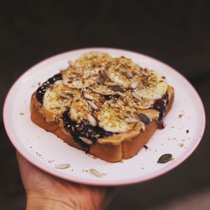 Toast with peanut butter, blueberry jam, banana. at Chillin' Cafe in Madrid