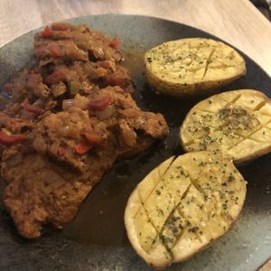 Meaty stew with buttery potatoes  at Chillin' Cafe in Madrid