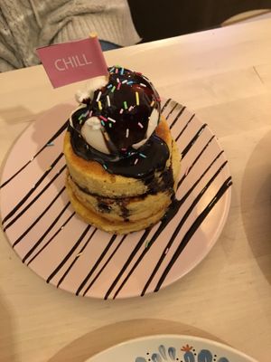 Pancakes w chocolate syrup and ice cream at Chillin' Cafe in Madrid