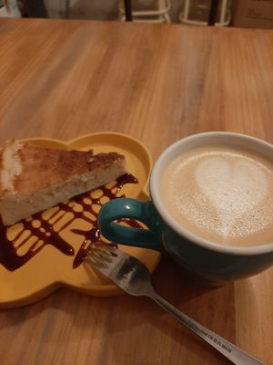 Cheescake and capuccino. at Chillin' Cafe in Madrid