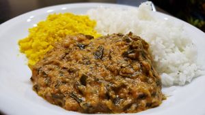 Feijoada do dia (R$30). Tasty spinach dish. Beans not pictured. at Congolinaria - Alfonso Bovero in Sao Paulo