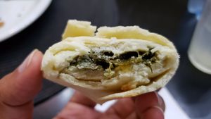 Sambussa espinafre (R$25). Thick dough and creamy filling. Not bad, not great. at Congolinaria - Alfonso Bovero in Sao Paulo