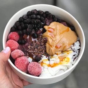 Acai bowl with extra strawberries & peanut butter  at Love Juice Bar in Paris