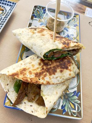 Shawarma with homemade seitan, garden tomato, spinach and vegan mayo at El Manglar in Oviedo