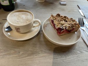 Cappuccino lait d’avoine et crumble pomme-cerise 🌱  at Le Pain Quotidien in Wemmel