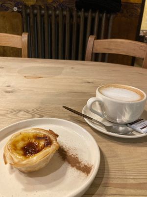 Oatmilk cappuccino and pastel de nata at Le Pain Quotidien in Leuven