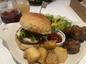 Fluunt Burger dinner menu. Fake cheese burger with fried soy meat, french fries and salad. Very delicious!  at Fluunt KOFU in Kofu