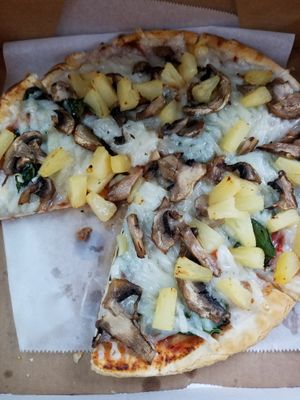 Vegan cheese, mushrooms, spinach and pineapple. at Poppa Rollo's Pizza in Waco
