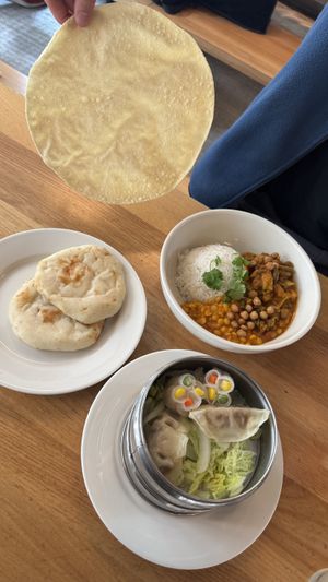 Naan, gyozas, papadum, curry  at Lily's Maxim in Basel
